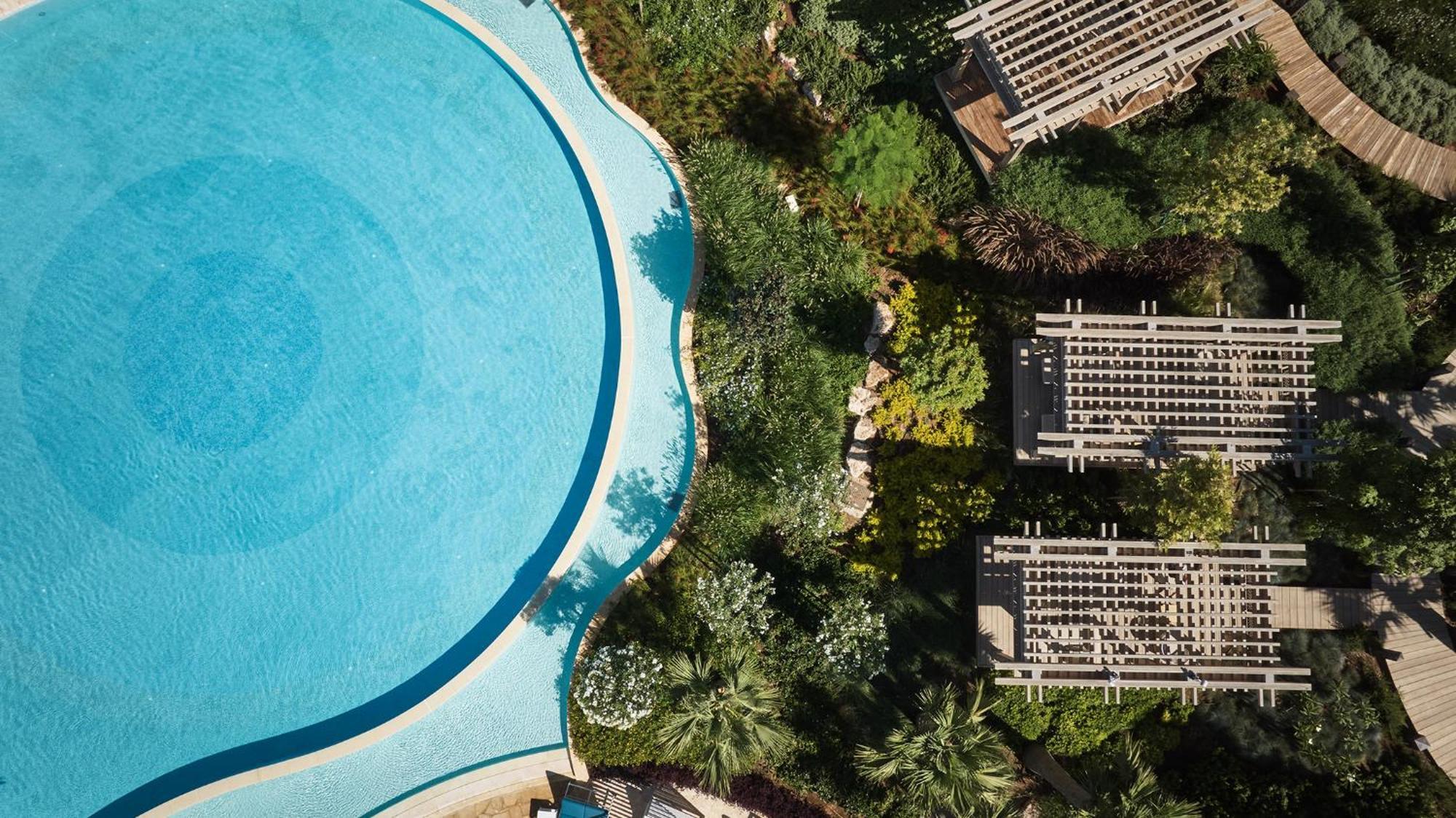 City Of Dreams Mediterranean - Integrated Resort, Casino & Entertainment Лімасол Екстер'єр фото Aerial view of the pool
